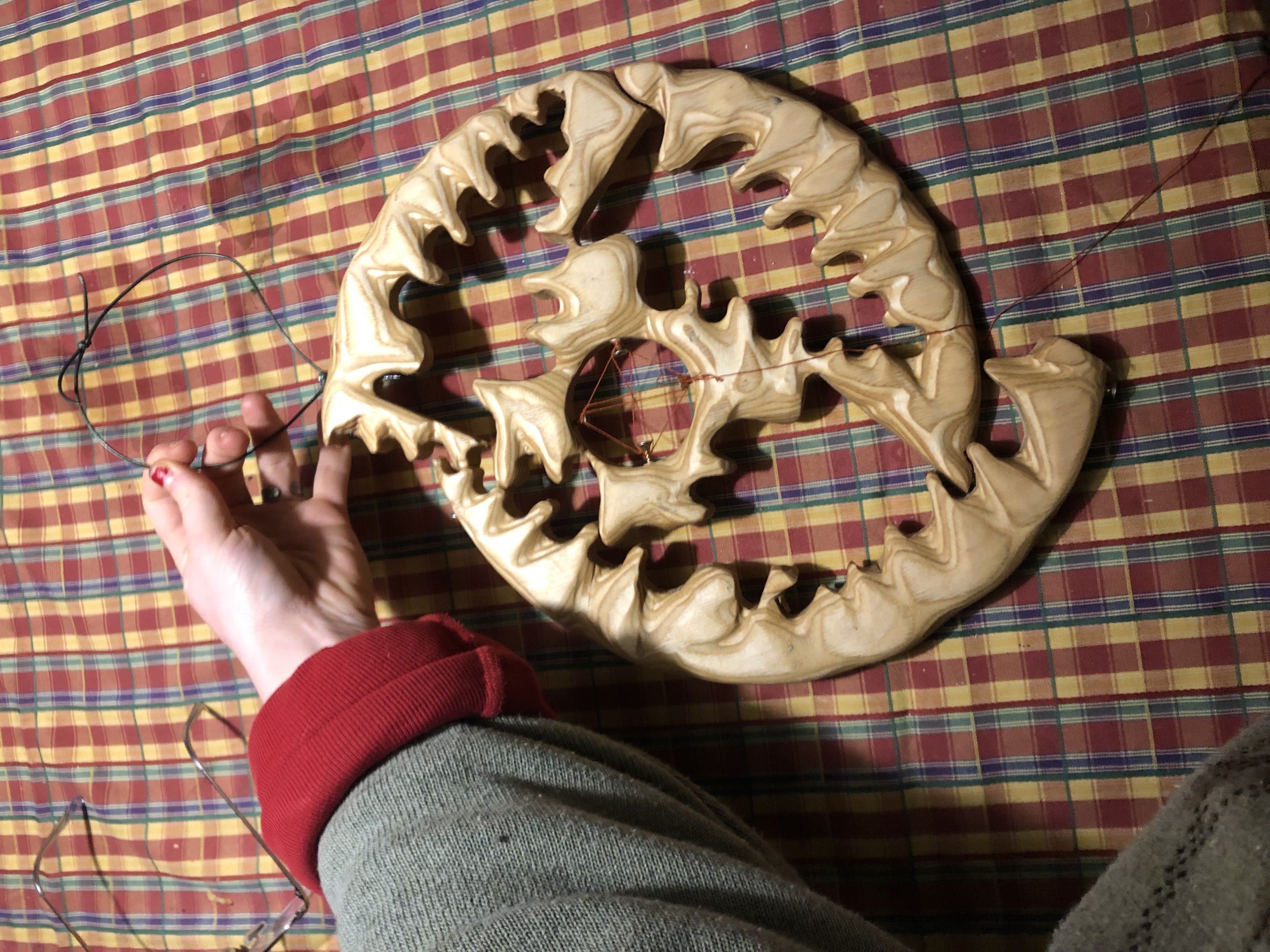 making sculptures from wood scraps 